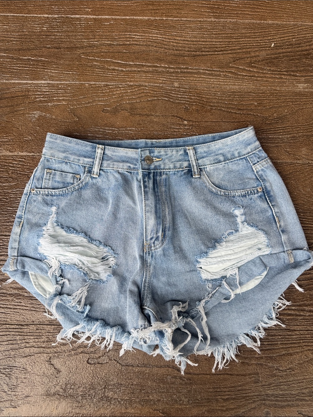 Women’s Light Blue Distressed Denim Shorts